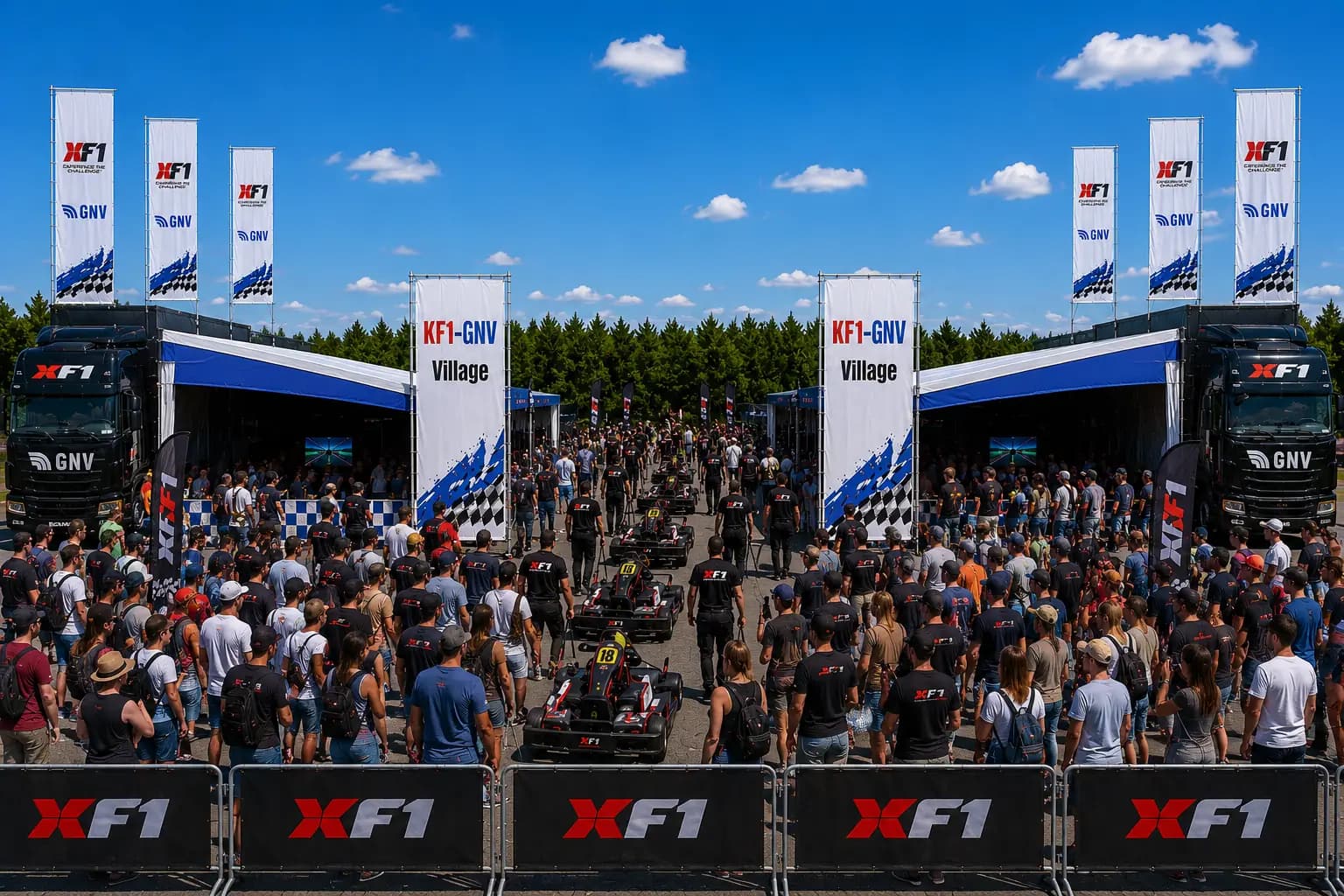 Pubblico nel villaggio KF1 tra i camion, kart in griglia